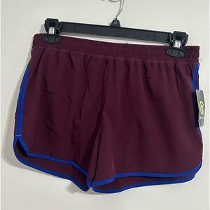 Champion sport short. ColorBerry Purple. Size M. New with tag.